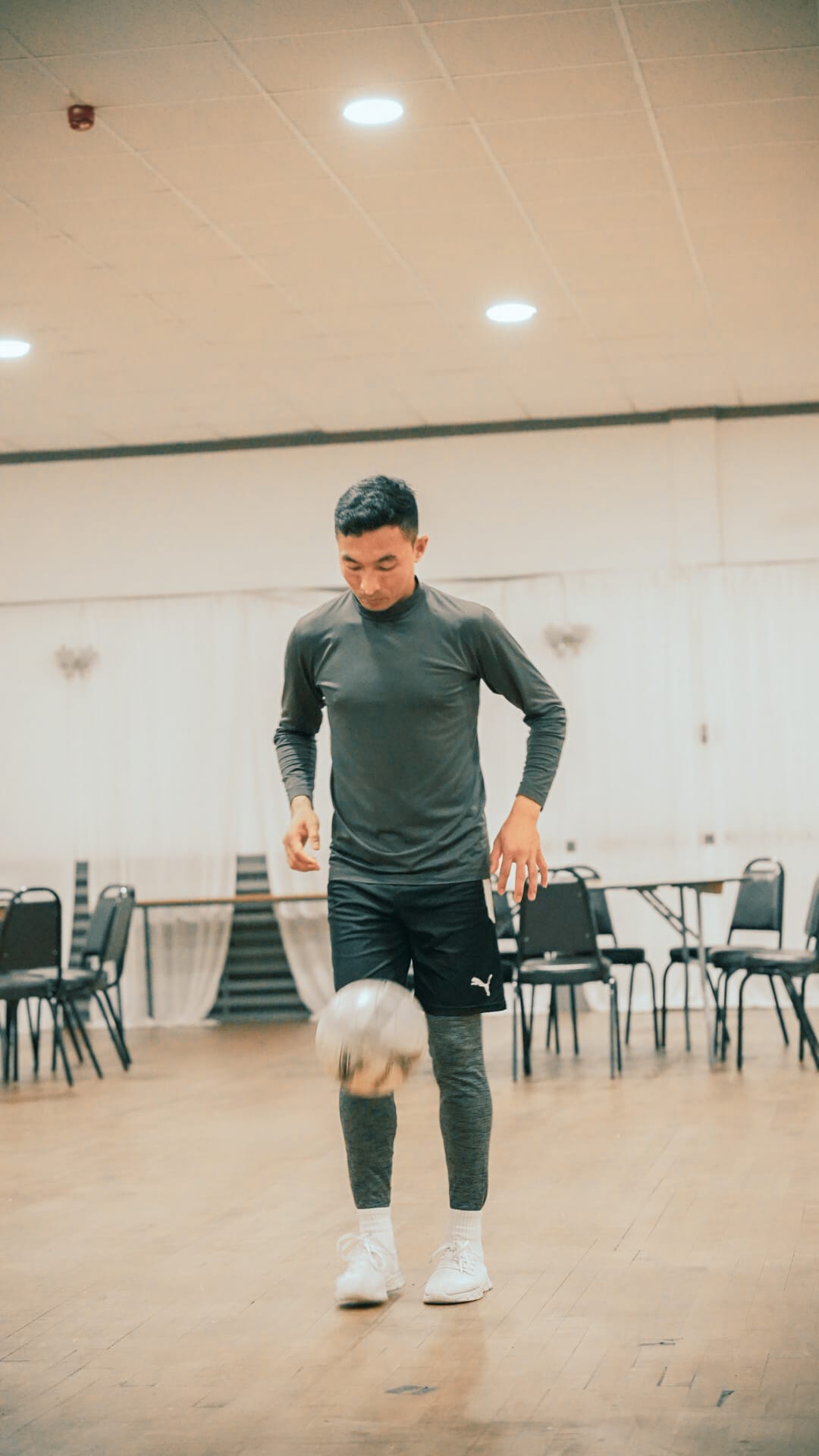 Sajan Dangol practising football juggling indoors